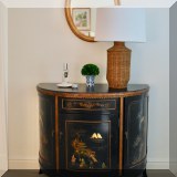 F37. Black vintage demilune chinoiserie bar/cabinet. 33”h x 36”w x 18”d 